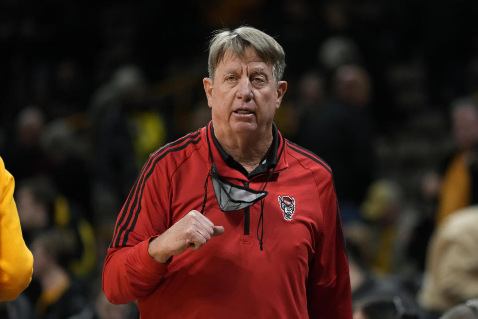 FILE - North Carolina State head coach Wes Moore walks off the court after an NCAA college basketball game against Iowa, on Dec. 1, 2022, in Iowa City, Iowa. With Duke rising to No. 9 in this week's AP Top 25, it marks only the second time since 2000 that each of neighboring schools Duke, North Carolina and North Carolina State have cracked the top 10 in the same season. (AP Photo/Charlie Neibergall, File)