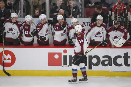 Feb 22, 2019; Chicago, IL, USA; Colorado Avalanche center Carl Soderberg (34) celebrates with teammates after scoring against the Chicago Blackhawks during the first period at United Center. Mandatory Credit: Kamil Krzaczynski-USA TODAY Sports