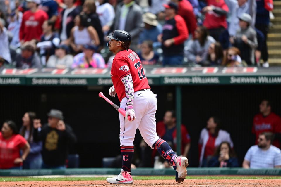 Guardians DH Josh Naylor watches his three-run home run off Los Angeles Angels reliever Carlos Estevez during the eighth inning, Sunday, May 14, 2023, in Cleveland.