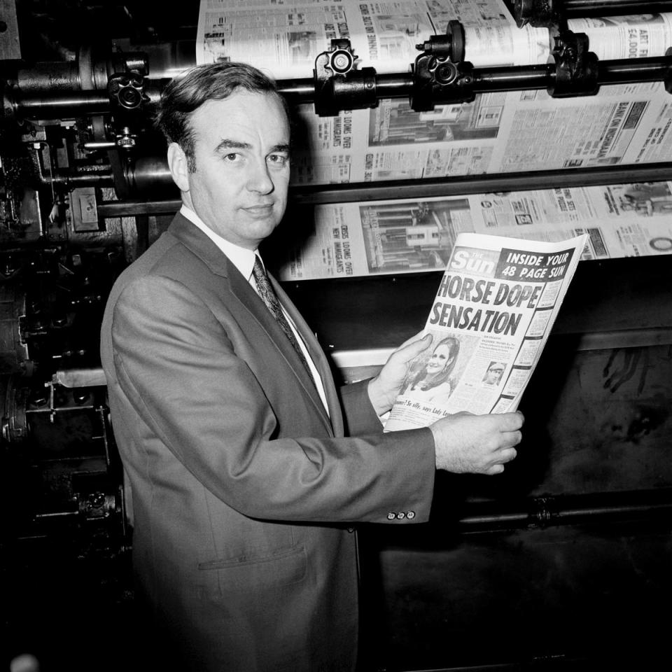 1969: Rupert Murdoch holds one of the first copies of the new Sun newspaper at the News of the World building in London: (PA)