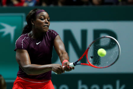 Tennis - WTA Tour Finals - Singapore Indoor Stadium, Kallang, Singapore - October 22, 2018 Sloane Stephens of the U.S. in action during her group stage match against Japan's Naomi Osaka REUTERS/Edgar Su