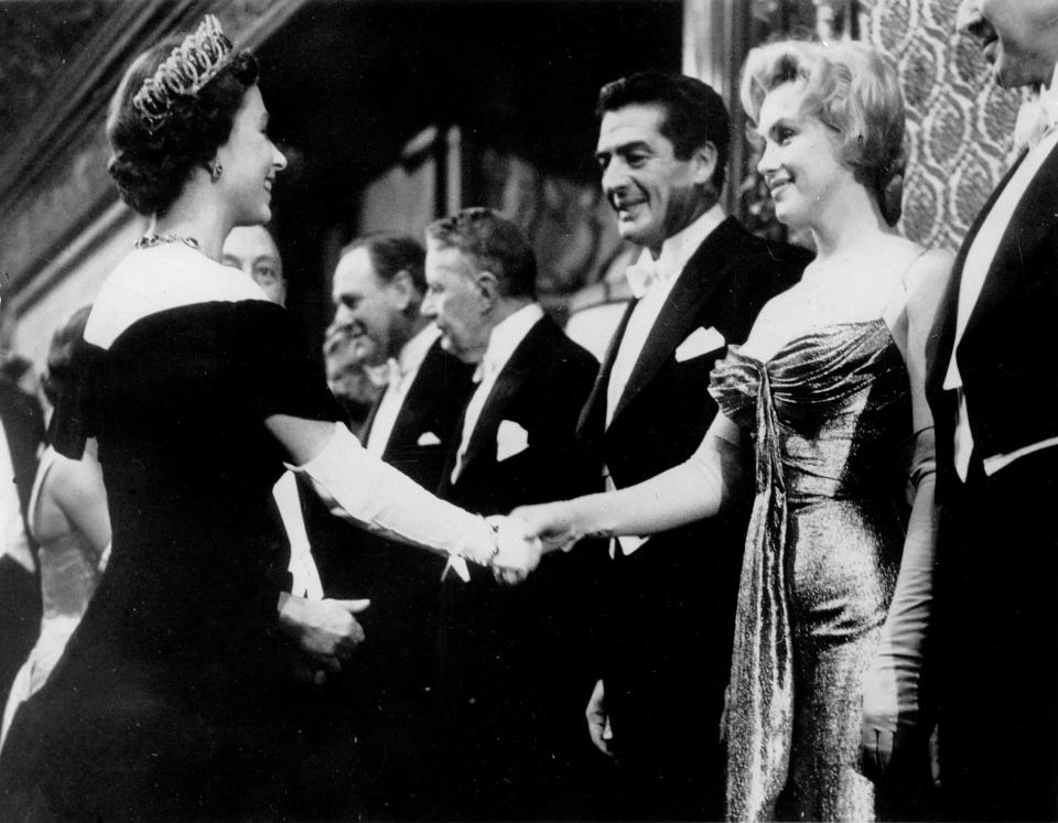 Marilyn Monroe meets Queen Elizabeth II in 1956 (ullstein bild via Getty Images)