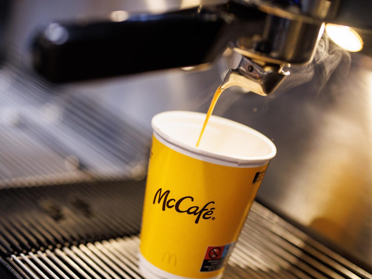 A McCafe coffee being made by a machine at a McDonald's in Germany