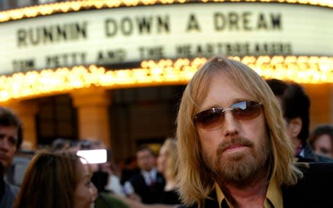 Tom Petty arrives at the world premiere of the documentary "Runnin' Down a Dream: Tom Petty and the Heartbreakers" in Burbank - Credit: AP