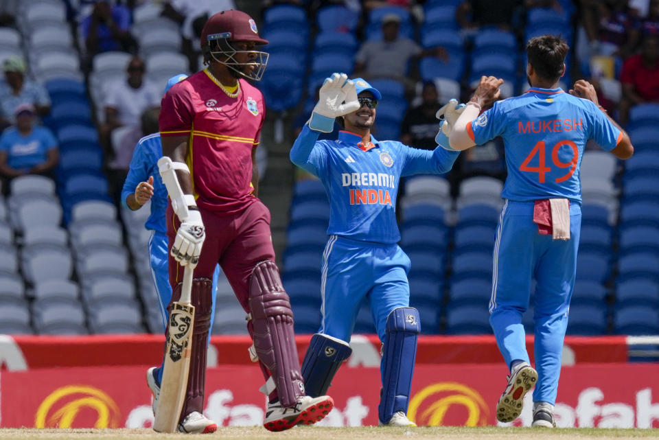 West Indies' Kyle Mayers walks off the field bowled by India's Mukesh Kumar during the third ODI cricket match at the Brian Lara Stadium in Tarouba, Trinidad and Tobago, Tuesday, Aug. 1, 2023. (AP Photo/Ramon Espinosa)