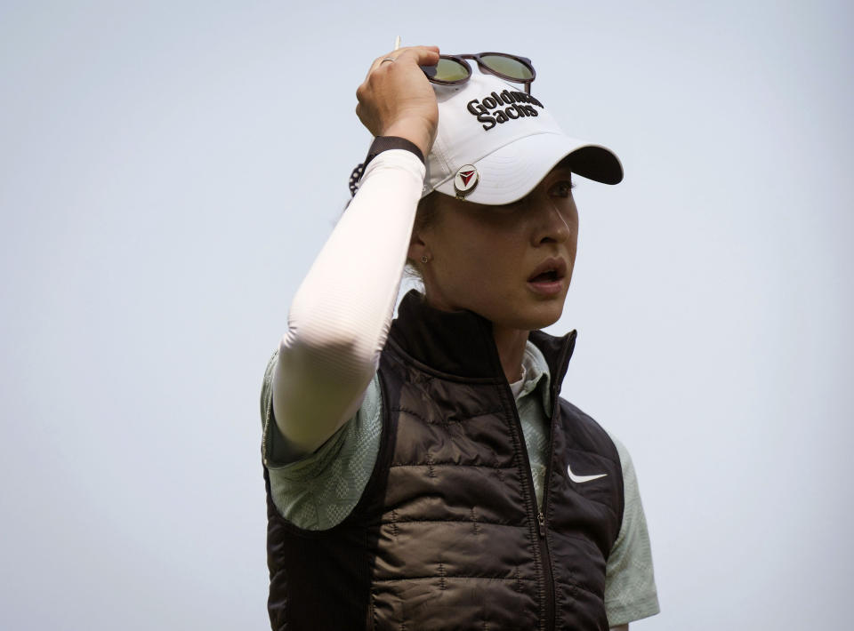 Nelly Korda, of the United States, walks from the tee box after hitting her tee shot on the first hole during the first round at the CPKC Canadian Women's Open golf tournament in Vancouver, British Columbia, Thursday, Aug. 24, 2023. (Darryl Dyck/The Canadian Press via AP)