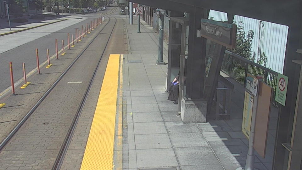 Surveillance video shows Colin Dudley seated at the light rail station stop. Det. Salmon believes he was gathering himself after murdering Kassanndra. / Credit: Pierce County Sheriff's Department