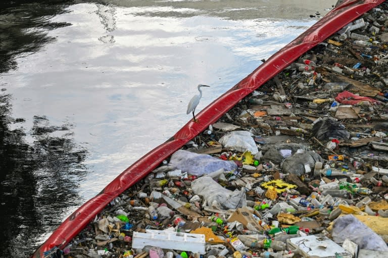 The Philippines produces about 61,000 tonnes of trash every day, up to 24 percent of it plastic, figures from the environment department show (JAM STA ROSA)