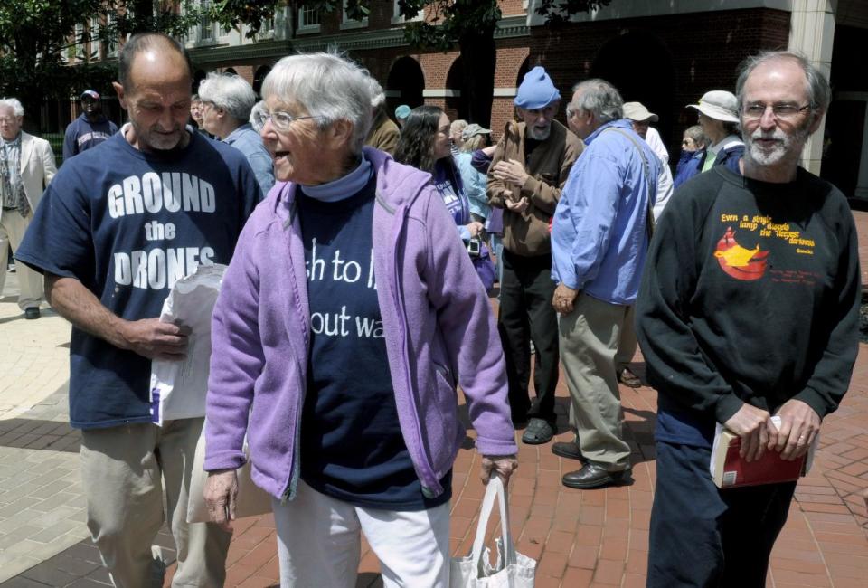 FILE - In this Monday, May 6, 2013, file photo, anti-nuclear weapons activists, from left, Michael Walli, Sister Megan Rice and Greg Boertje-Obed arrive for their trial in Knoxville, Tenn. All three were convicted on May 8, 2013, of interfering with national security when they broke into a nuclear weapons facility in Tennessee and defaced a uranium processing plant. The activists will learn Tuesday, Feb. 18, 2014, whether they will spend the next six to nine years in prison. (AP Photo/Knoxville News Sentinel, J. Miles Cary, File)