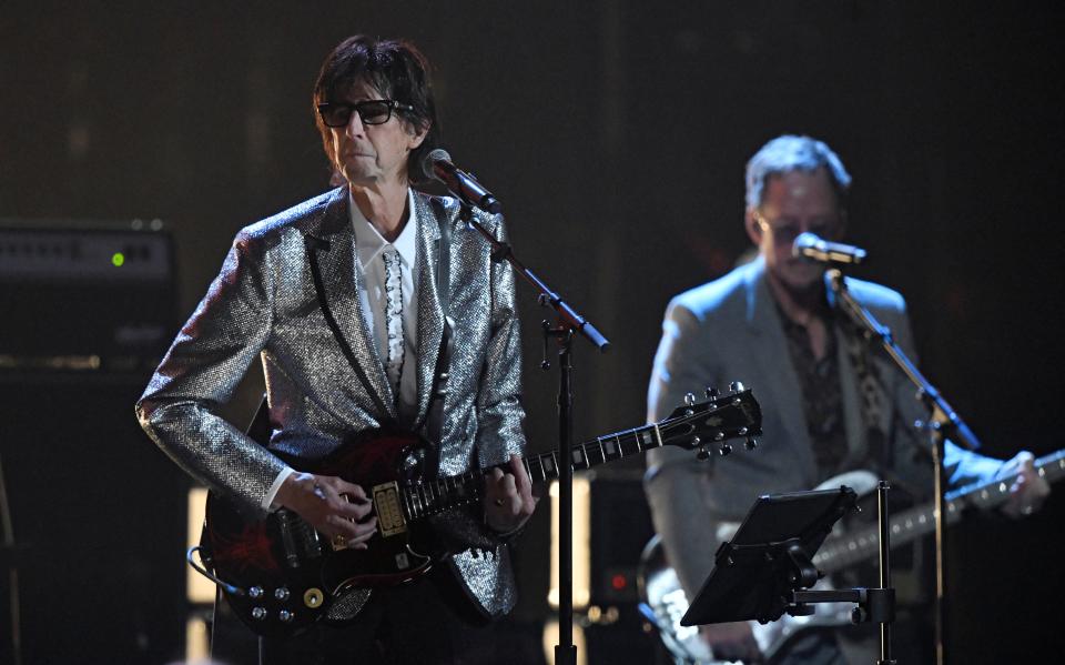 Ric Ocasek, left, of The Cars, performs during the Rock and Roll Hall of Fame induction ceremony on April 14, 2018, in Cleveland.