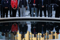 <p>People stand around a reflecting pool in the middle of Ground Zero before the annual memorial service September 11, 2010 in New York City. Thousands will gather to pay a solemn homage on the ninth anniversary of the terrorist attacks that killed nearly 3,000 people on September 11, 2001. (Photo by Chris Hondros/Getty Images) </p>