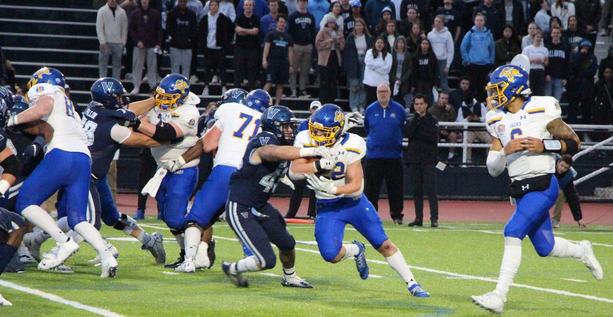 Isaiah Davis runs the ball in the third quarter of Saturday's FCS playoff game