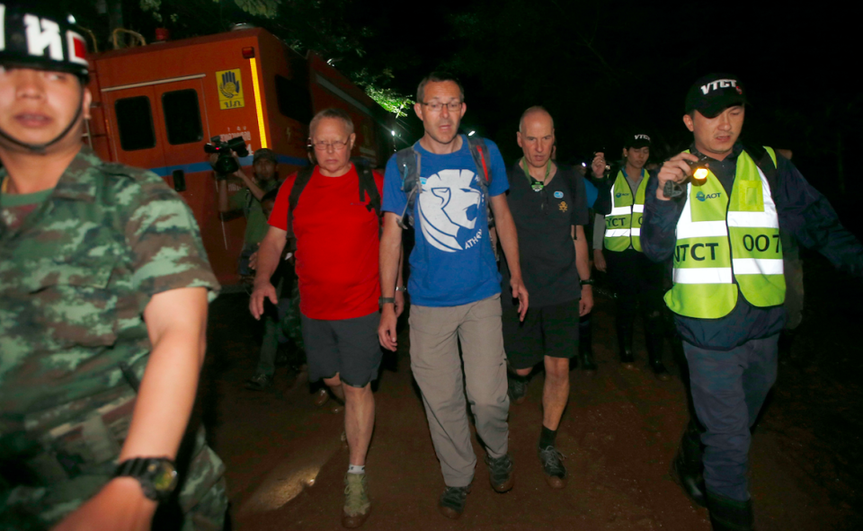 British Cave Rescue Council members from second left, Robert Charles Harper , John Volanthen and Richard William arrive at the cave before their successful search for the boys (Picture: PA)