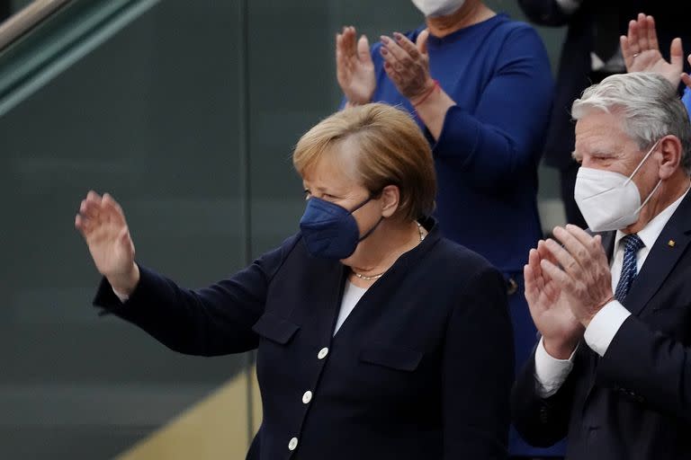 Olaf Scholz; Angela Merkel; alemania; ceremonia; el mundo