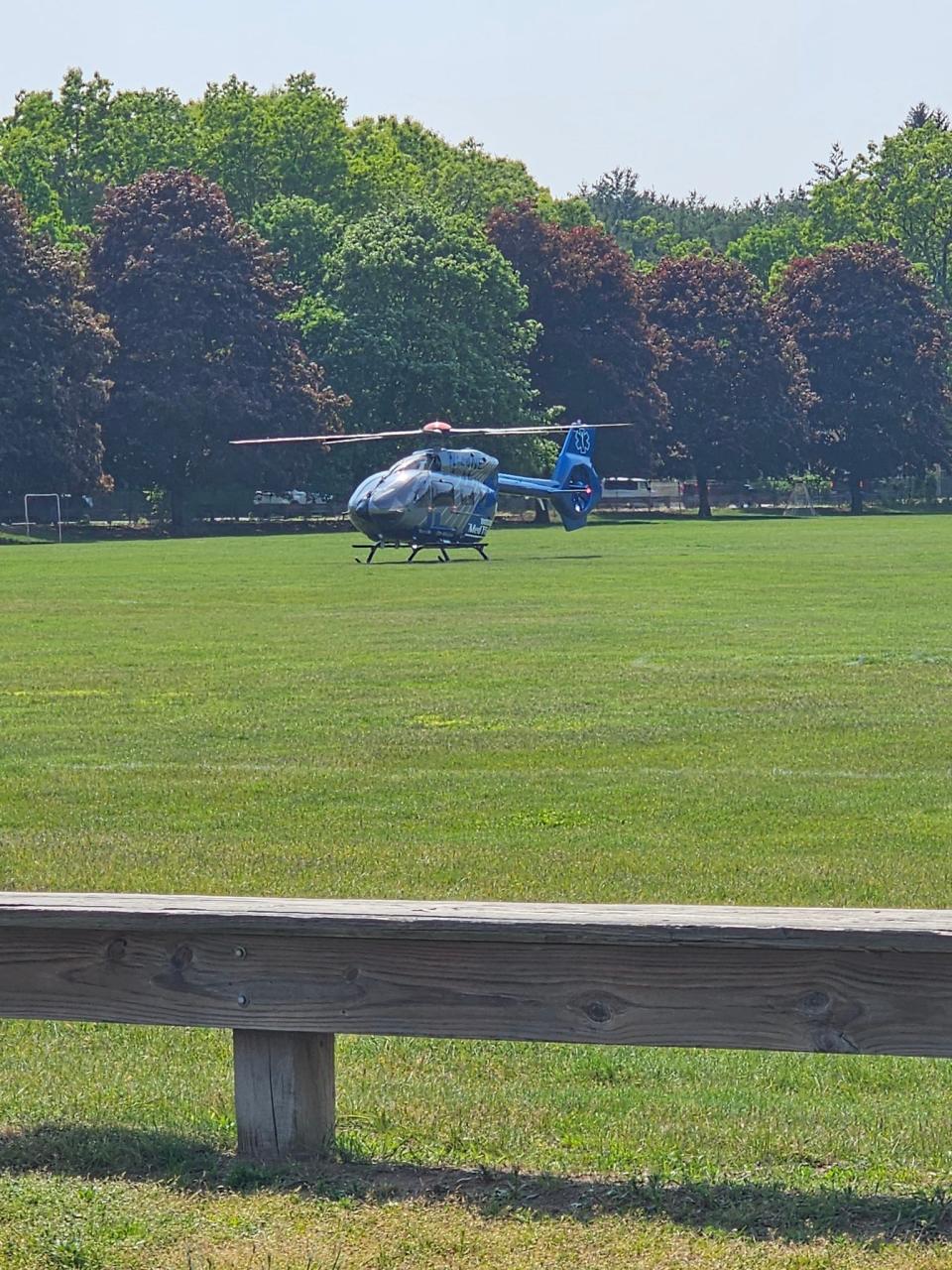 A medical rescue helicopter prepares to depart after picking up a man in Sudbury who was injured in a fall while riding a bicycle in the woods.