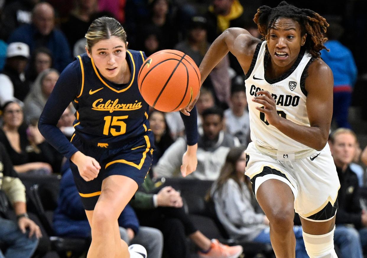 California guard Kemery Martin, left, and Colorado guard Jaylyn Sherrod pursue the ball during the first half of the game Friday, Jan. 12, 2024, in Boulder, Colo.