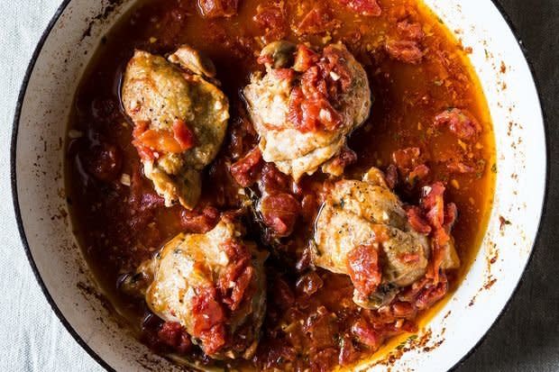 <strong>Get the <a href="http://food52.com/recipes/20892-braised-chicken-thighs-with-tomato-and-garlic" target="_blank">Braised Chicken Thighs with Tomato and Garlic recipe</a> from Food52</strong>