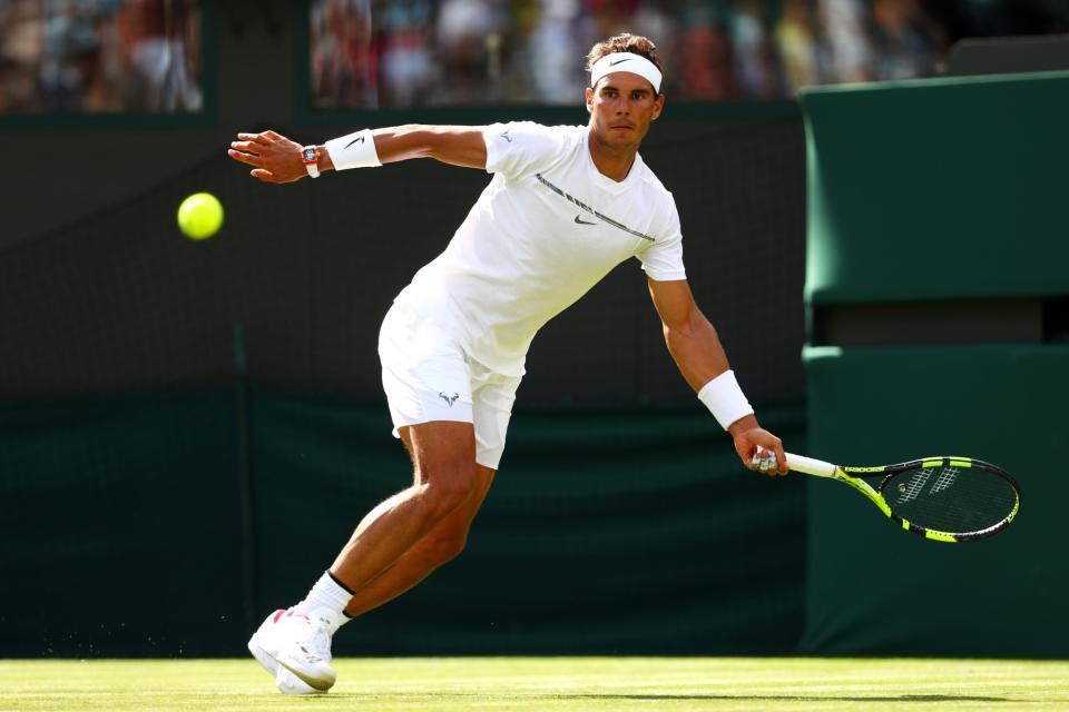 Rafael Nadal of Spain plays a forehand during the Gentlemen's Singles first round match on day one of the Wimbledon Lawn Tennis Championships at the All England Lawn Tennis and Croquet Club on July 3, 2017 in London, England.