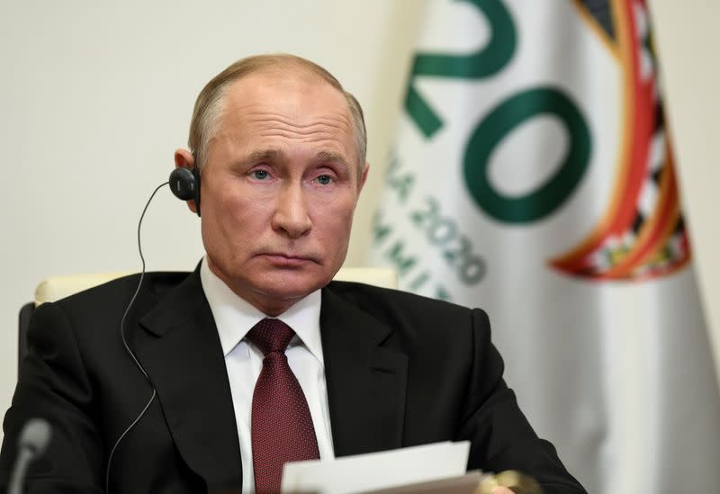 FILE PHOTO: Russian President Vladimir Putin takes part in a video conference during the G20 Leaders' Summit 2020