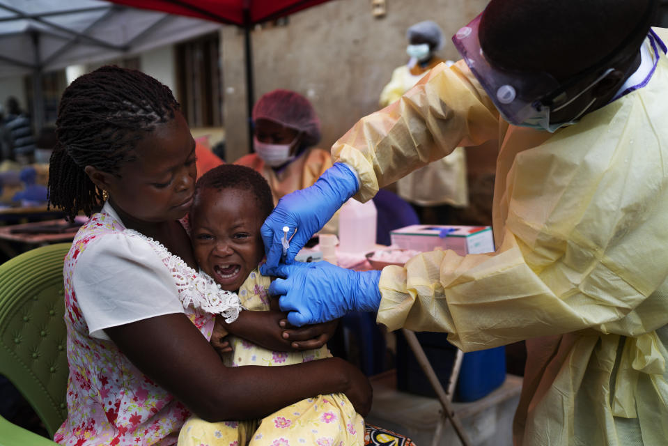 In this Saturday, July 13, 2019 file photo, a child is vaccinated against Ebola in Beni, Congo. The World Health Organization says Monday, Sept. 23, 2019 Congo will start using a second experimental Ebola vaccine, as efforts to stop the spiraling outbreak are stalled and Doctors Without Borders criticizes vaccination efforts to date. (AP Photo/Jerome Delay, file)