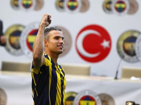 Netherlands striker Robin van Persie greets supporters during his contract-signing ceremony with Turkish club Fenerbahce at Sukru Saracoglu Stadium in Istanbul, Turkey, July 14, 2015. REUTERS/Osman Orsal