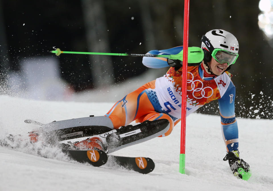 Norway's Henrik Kristoffersen passes a gate in the second run of the men's slalom to win the bronze medal at the Sochi 2014 Winter Olympics, Saturday, Feb. 22, 2014, in Krasnaya Polyana, Russia. (AP Photo/Luca Bruno)