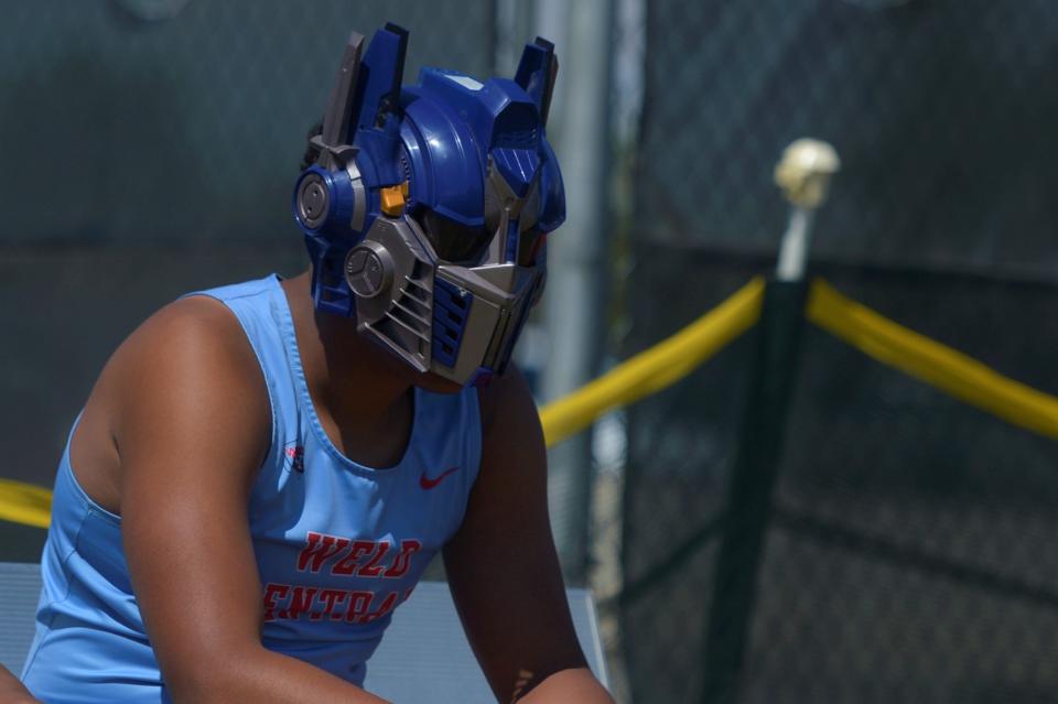 A Weld Central shot put competitor wears Transformers mask between attempts during the Colorado high school state track and field meet at Jeffco Stadium in Lakewood on Saturday, May 21, 2022.