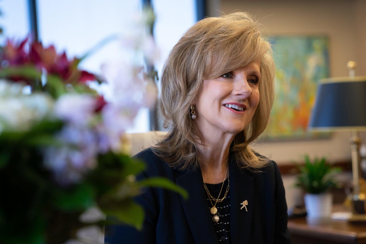 JuliAnn Mazachek's base salary as Washburn University president is $335,000.