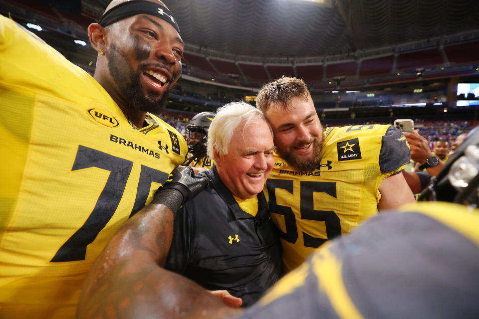 Phillips celebrates with players after advancing to the championship. (Dilip Vishwanat/UFL/Getty Images)