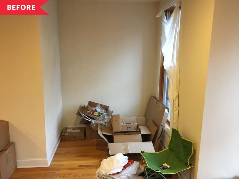 Before: apartment nook with unpacked boxes on the floor