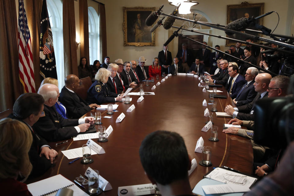 President Donald Trump, center left, leads a roundtable discussion on border security with local leaders, Friday Jan. 11, 2019, in the Cabinet Room of the White House in Washington. (AP Photo/Jacquelyn Martin)