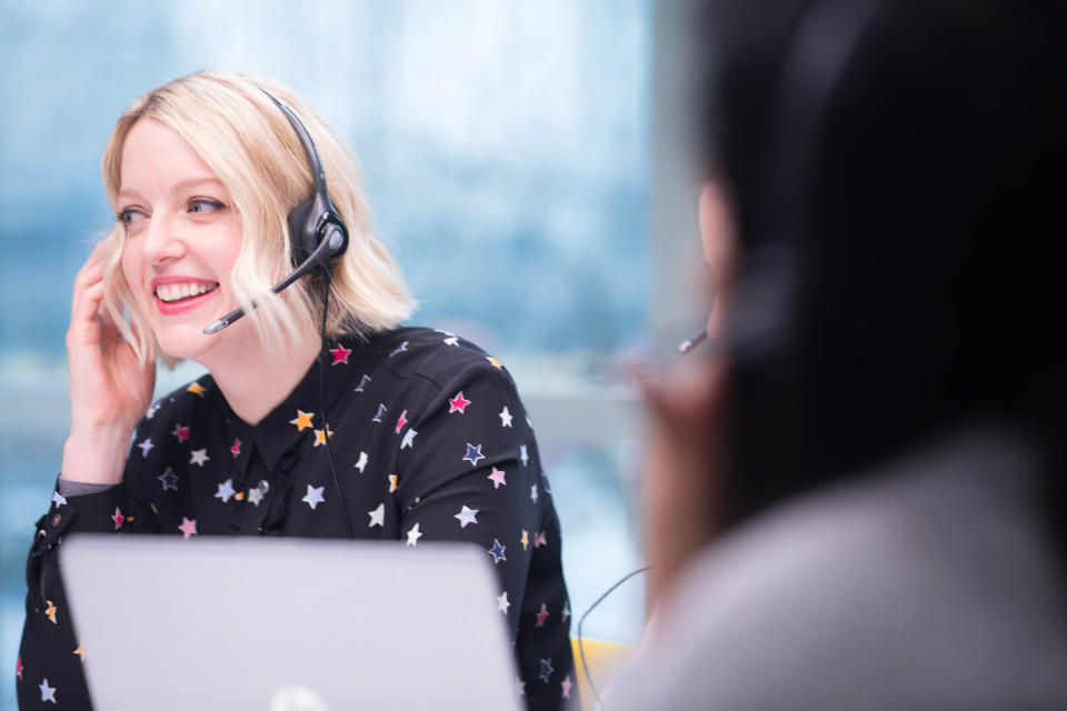 EDITORIAL USE ONLY Lauren Laverne takes calls on Zopa�s �FeelGood Hotline�, as the 'FeelGood Money' company aims to help banish the January blues, in London.