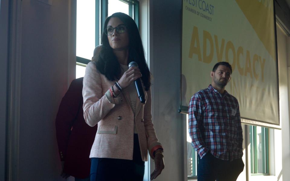 Lindsay Kronemeyer, Republican candidate for Michigan House District 43, speaks during a candidate forum hosted by the West Coast Chamber of Commerce at Boatwerks Restaurant on Monday, June 20, 2022.