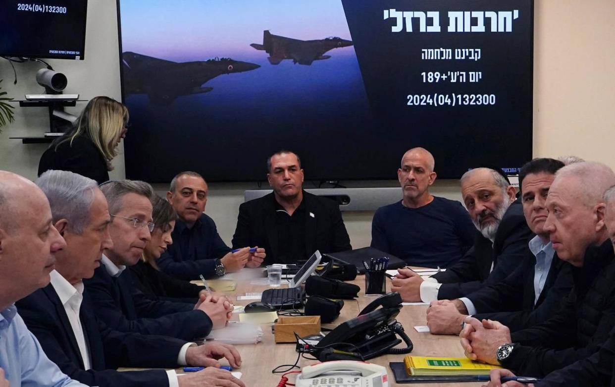 Israel's war cabinet, chaired by Benjamin Netanyahu (2nd left), meeting to discuss the drone attack launched by Iran