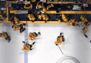 May 22, 2017; Nashville, TN, USA; Nashville Predators players leave the bench over the boards following a 6-3 win against the Anaheim Ducks in game six of the Western Conference Final of the 2017 Stanley Cup Playoffs at Bridgestone Arena. Mandatory Credit: Christopher Hanewinckel-USA TODAY Sports
