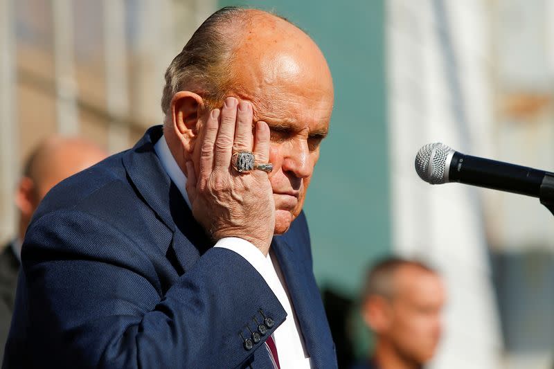 Former New York City Mayor Rudy Giuliani, personal attorney to U.S. President Donald Trump gestures in Philadelphia