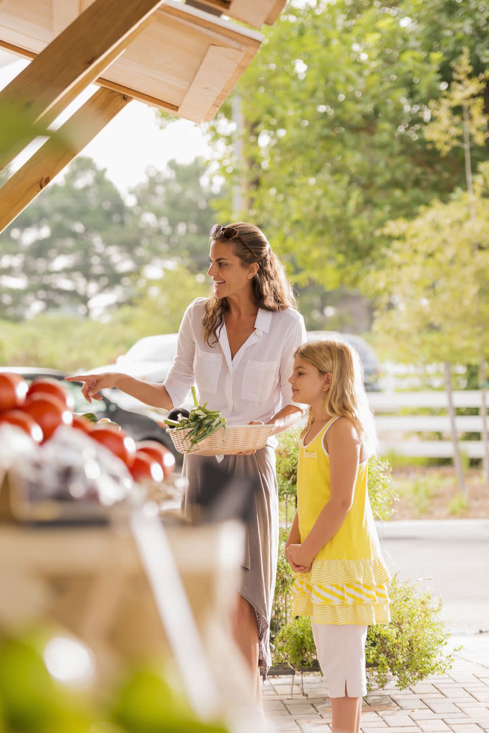 woman and child at a farmers market