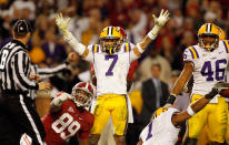 TUSCALOOSA, AL - NOVEMBER 05: Tyrann Mathieu #7 of the LSU Tigers looks at the referee after teammate Eric Reid #1 intercepts the ball against Alabama Crimson Tide during the second half of the game at Bryant-Denny Stadium on November 5, 2011 in Tuscaloosa, Alabama. (Photo by Streeter Lecka/Getty Images)