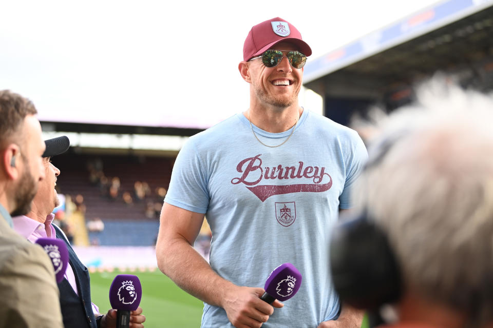 JJ Watt is interviewed ahead of the Premier League match between Burnley and Manchester City on August 11, 2023. (Michael Regan/Getty Images)