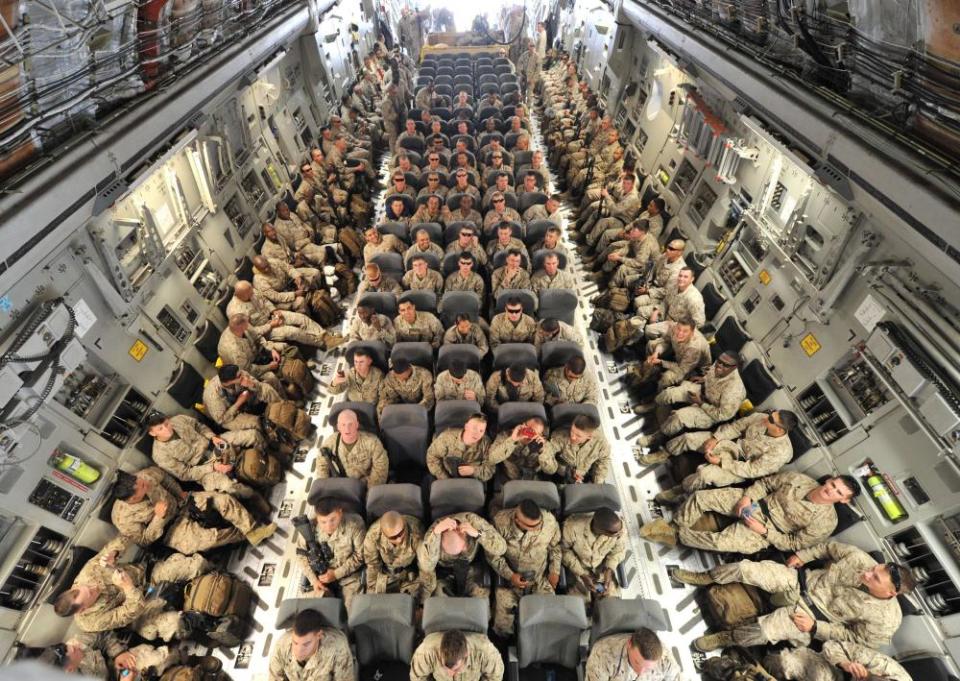 US service personnel on a plane bound for Afghanistan
