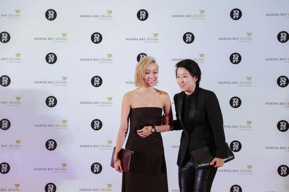 (Left -Right) Singaporean writer Amanda Lee Koe and film maker Kirsten Tan oblige for photos on the red carpet during their attendance at the 28th SGIFF Benefit Dinner at the Marina Bay Sands Expo & Convention Centre. (Photo: Don Wong for Yahoo Lifestyle Singapore)