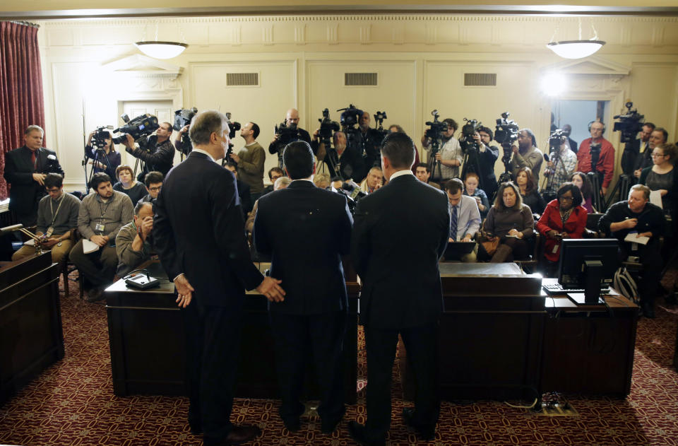 New Jersey Assemblymen John S. Wisniewski, left, D-Sayreville, N.J., listens with Lou Greenwald, right, D-Vorhees, N.J., as incoming Assembly Speaker Vincent Prieto, D-Secaucus, N.J., answers a question Monday, Jan. 13, 2014, in Trenton, N.J. The group announced a new special legislative committee will be tasked with finding out how high up New Jersey Gov. Chris Christie's chain of command a plot went that was linked through emails and text messages to a seemingly deliberate plan to create traffic gridlock in a town at the base of the George Washington Bridge after its mayor refused to endorse Christie for re-election. (AP Photo/Mel Evans)