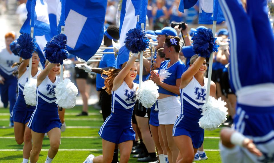 Kentucky cheerleaders and the team come out on to the field against Ball State at Kroger Field.
Sept. 2, 2023