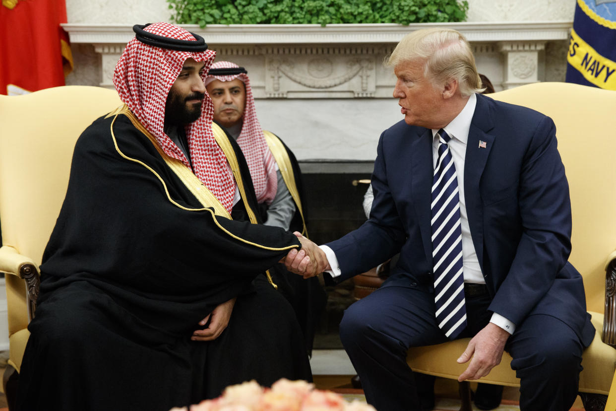 President Donald Trump shakes hands with Saudi crown prince Mohammed bin Salman in March 2018.&nbsp; (Photo: ASSOCIATED PRESS)