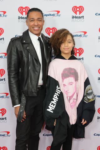 <p>Michael Loccisano/Getty</p> T.J. Holmes with his daughter Sabine at the iHeartRadio Jingle Ball in New York City