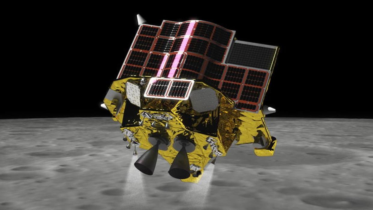  A roughly cube-shaped spacecraft covered in solar panels descends to the surface of the moon. 