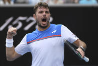 Switzerland's Stan Wawrinka reacts during his fourth round singles match against Russia's Daniil Medvedev at the Australian Open tennis championship in Melbourne, Australia, Monday, Jan. 27, 2020. (AP Photo/Andy Brownbill)