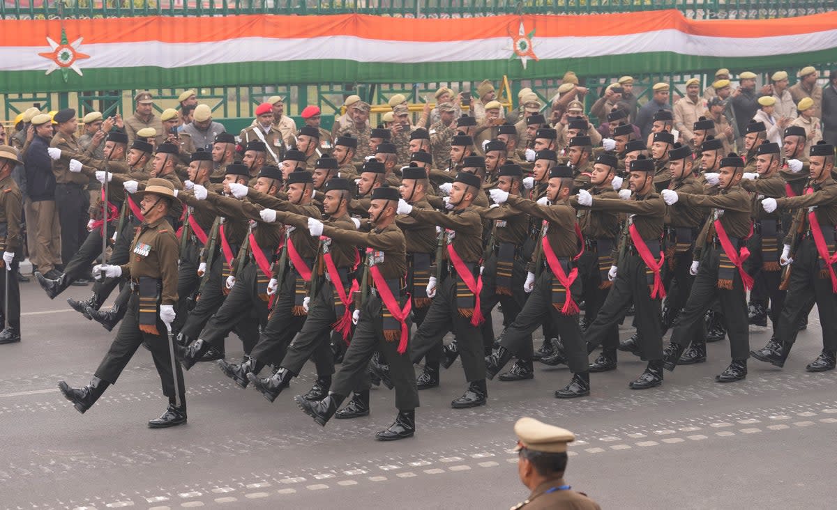 Indian army soldiers march in front of the Vidhan Sabha during the Republic Day parade in Lucknow, capital of northern Indian state of Uttar Pradesh, Friday, 26 January 2024 (Associated Press)