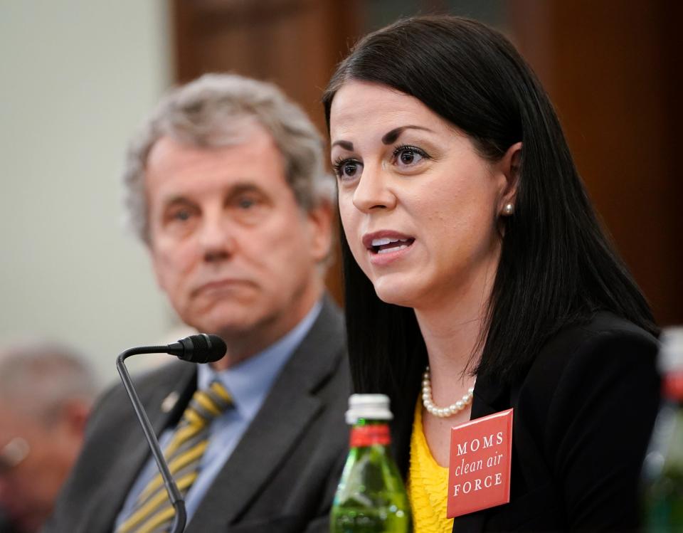 Misti Allison, a resident of East Palestine, Ohio, speaks along with Senator Sherrod Brown (D-OH), left, during the Senate hearing on Improving rail safety in response to the East Palestine, Ohio train Derailment on Wednesday, March 22, 2023.