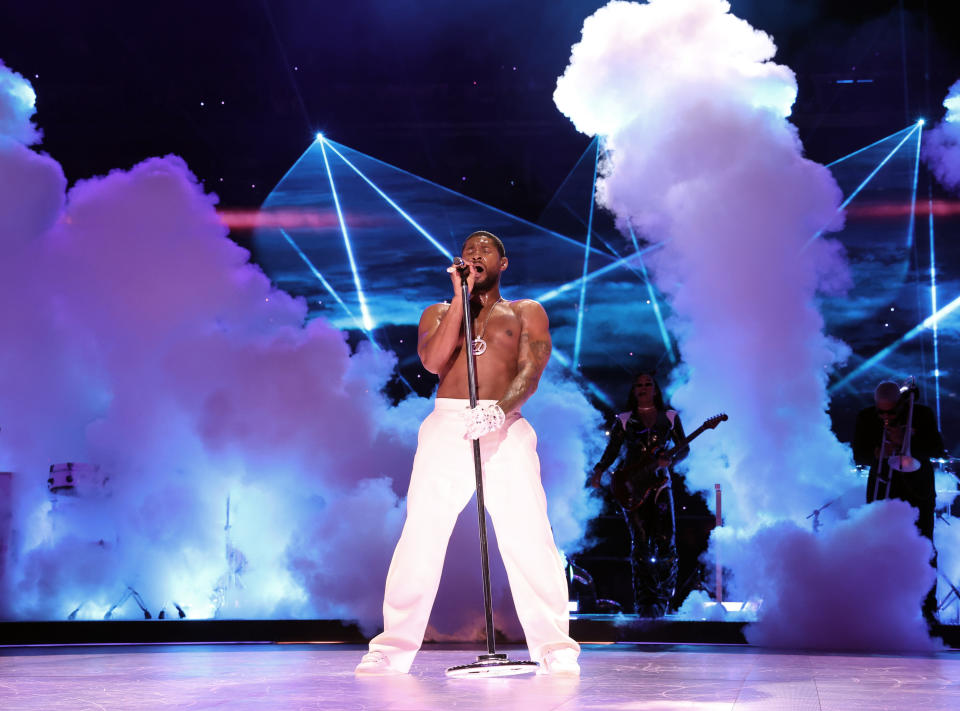 Usher onstage at the Super Bowl